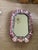 This beautiful antique shell mirror features an octagonal beveled mirror plate set within a handcrafted frame lavishly...