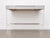Vintage Lucite bar featuring a white laminate top, mirrored drawer fronts and a clear Lucite frame. Decorative circular...
