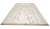 This hand knotted pile rug features a versatile palette of ivory, beige, cream, and white tones. Crafted from natural...