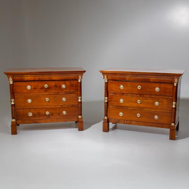 Pair of large-scale Italian chests of drawers from the 19th century, each featuring four drawers, three of which are...