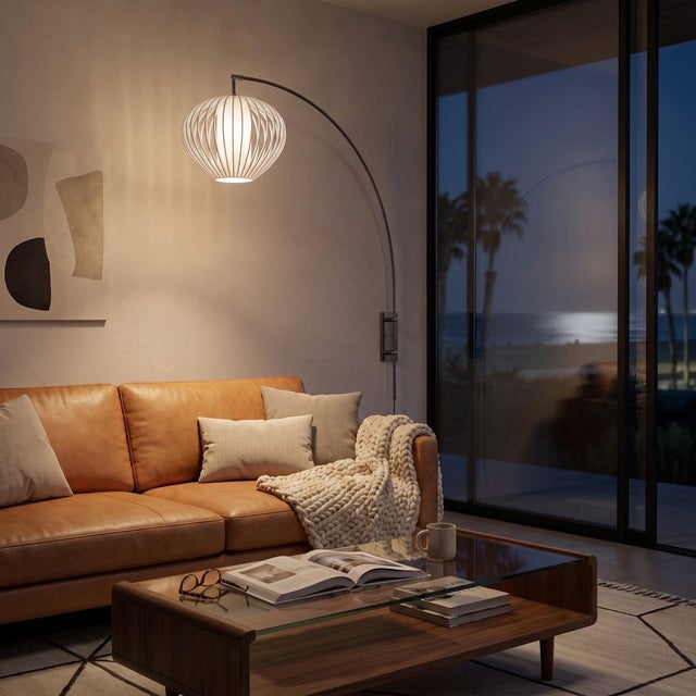 The Sphere Arc Lamp is a striking arc lamp with a black nickel finish and a white satin sphere shade, embodying NOVA of...