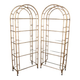 Gold Gilded Arched Faux Bamboo Steel Etageres Bookshelves, Circa 1950s - A Pair For Sale