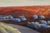 Landscape scene of a road through desert cliffs titled "Passage" by Scott Allen (American, 20th Century). Signed in the...