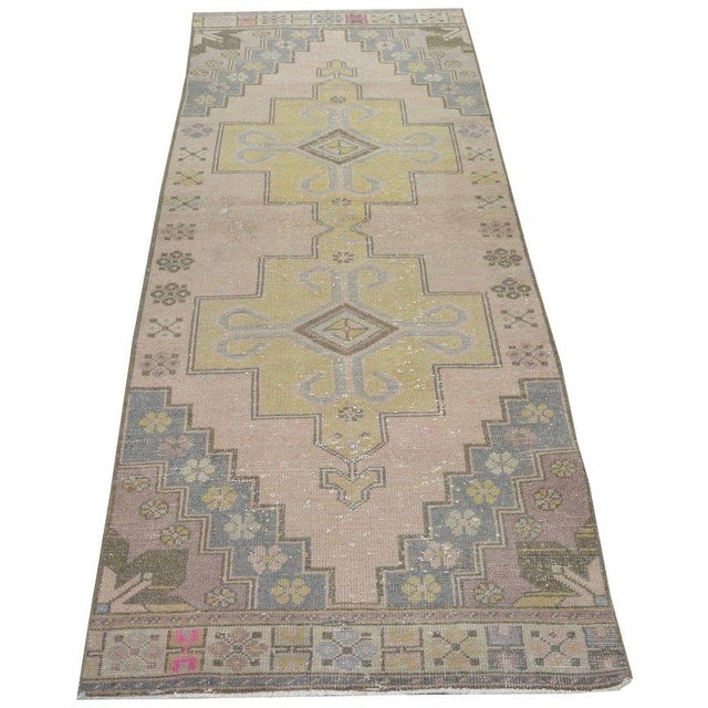 Hand-knotted with care using traditional rug-making techniques, this wool rug blends timeless craftsmanship with a modern...