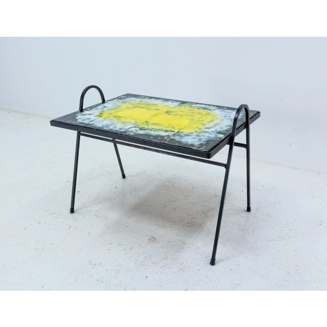 Iron serving table or coffee table recovered of Black white and yellow ceramics, Signed by Carve French, circa 1960 Colors...