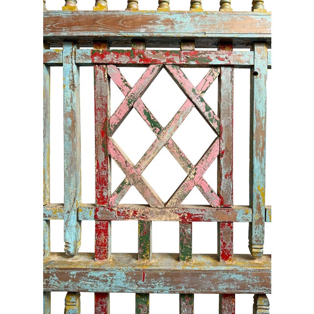Vintage Indian wood lattice screen panel with original colorful painted finish. Paint colors of turquoise, yellow, red,...