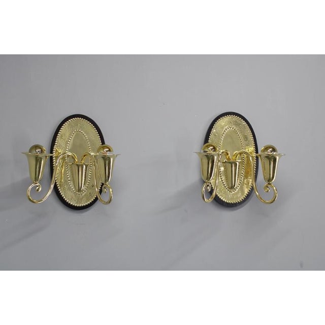 This rare pair of Art Nouveau wall sconces was produced in Czechoslovakia in the 1920s and reflects the refined aesthetics...
