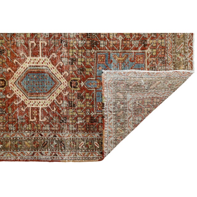 This exceptional antique Heriz (Serapi-style) runner rug beautifully marries historic craftsmanship with a highly sought-...