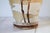 Vintage studio art pottery ceramic vase featuring a long-legged sandpiper wading bird against a neutral, earthy background...