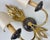 Vintage single sconce in the Empire style from Italy, circa 1950s. Made of wood and gilded metal with decorative trim and...