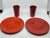 Magnificent and rare set of four pieces in monochrome glazed terracotta, a vibrant and intense red/orange, created by the...