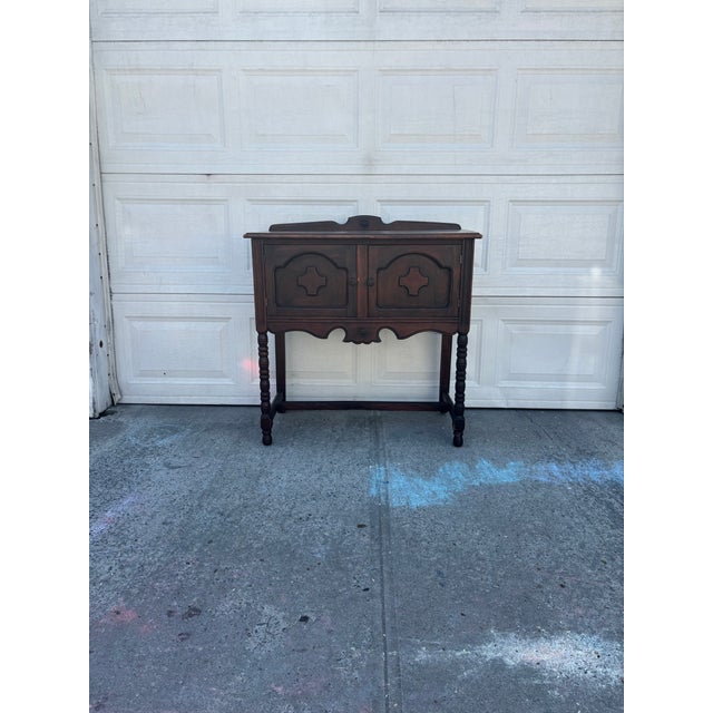 We have a beautiful vintage server cabinet for sale, featuring classic traditional styling and a highly versatile design...