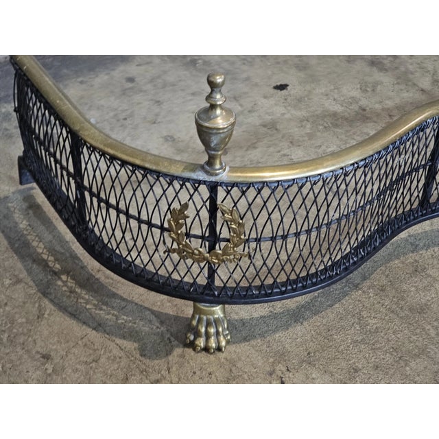 Metal Brass and Steel Woven Serpentine Fireplace Fender With Wreath Designs & Paw Feet For Sale - Image 7 of 9