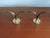 Beautiful and elegant pair of Liljan solid brass candle holders designed by Swedish sculptor and designer, Ivar Alenius...
