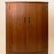 This sophisticated British-made bar cabinet embodies the functional elegance of 1960s Mid-Century design. Crafted from...