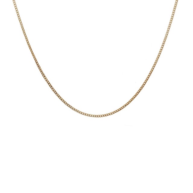 This is a mid-century 17k yellow gold 22" curb link necklace. A nice-weight neckchain, in excellent condition. The...