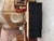 This antique sideboard has been fully restored. It features a black patinated base with a raw wood top. It is fitted with...