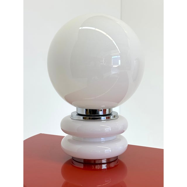 This beautiful table lamp from the 1970s is an example of Space Age design and is reminiscent of designs by Josef...