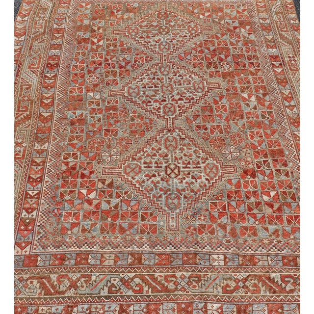 Antique Distressed Persian Medallion Shiraz Rug in Shades Rusty Red & Steel Blue For Sale - Image 4 of 10