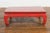 A Chinese Qing Dynasty period low Kang table from the 19th century, with chow legs, carved apron and restored with custom...