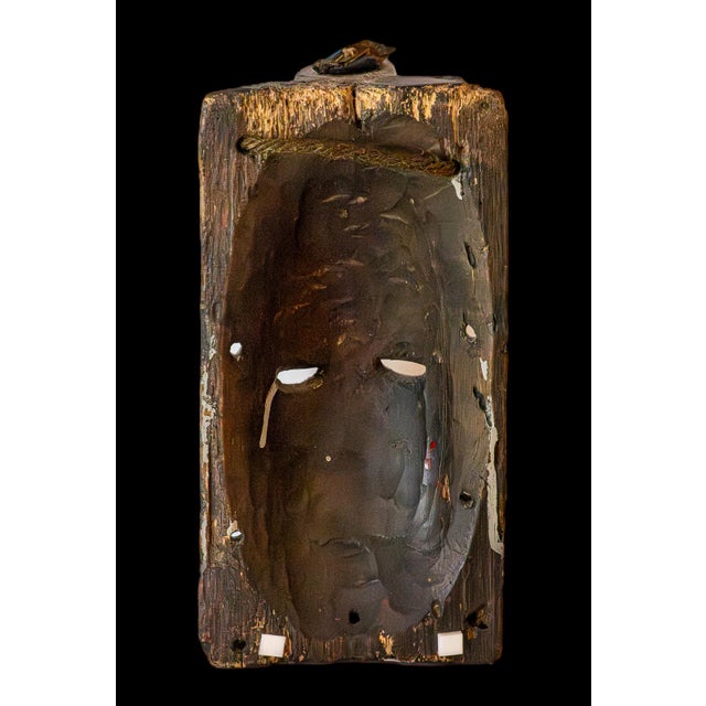 Overview: A finely carved ethnographic mask representing the Agbogho Mmuo (Maiden Spirit) tradition of the Igbo people of...