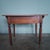 An authentic antique table from the Gründerzeit period with a warm, dark surface and a beautiful, serene appearance. The...