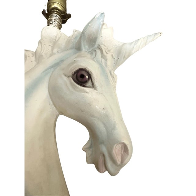 21” tall One of the unicorns has a little chip at the end of the horn as shown, otherwise good condition Add a touch of...