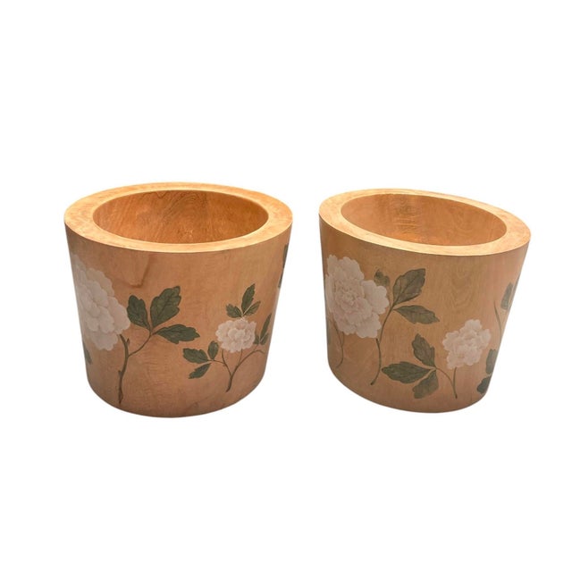 A striking pair of vintage solid teak cache pots. Masterfully turned from hefty, solid blocks of natural teak wood, these...