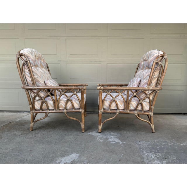 DESCRIPTION: Pair of large scale wing back lounge or club chairs made by McGuire of San Francisco. Pickled gray/brown...