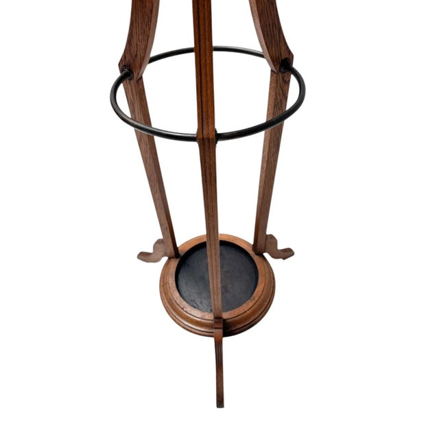 Magnificent and rare Arts & Crafts coat stand or porte manteau. Striking Dutch design from the 1900s. Solid oak frame with...
