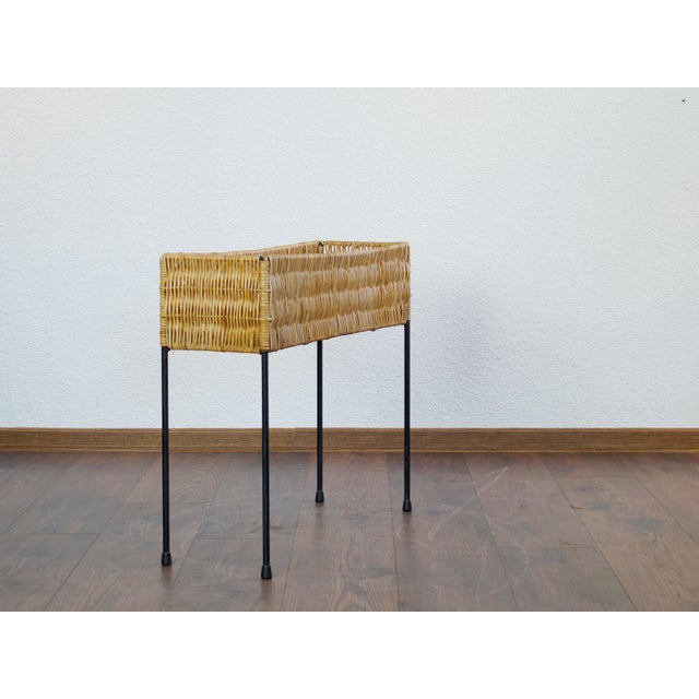 A very stylish flower stand from the 1950s, attributed to Carl Auböck. While comparable pieces are lacking, the design is...