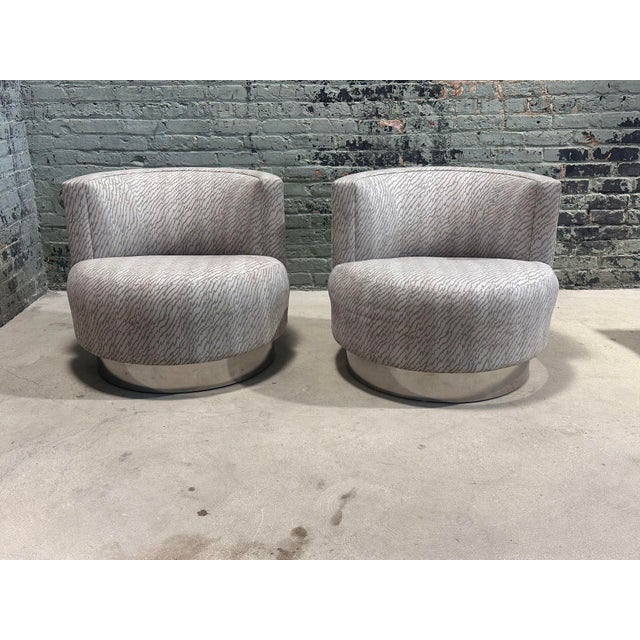 Pair of "Mala" Style Swivel Chairs, after Franco Fraschini, Italy 1970. Chrome plinth bases. Original upholstery. Measure...