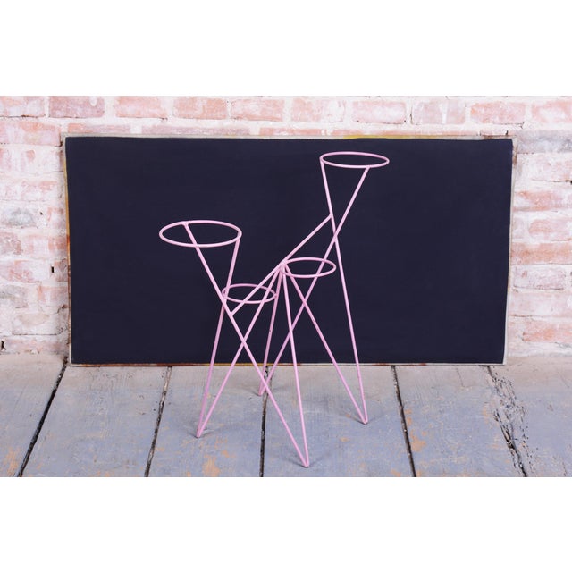 This stylish plant stand dates back to the 1950s and was manufactured in Czechoslovakia, where it represents a highly...