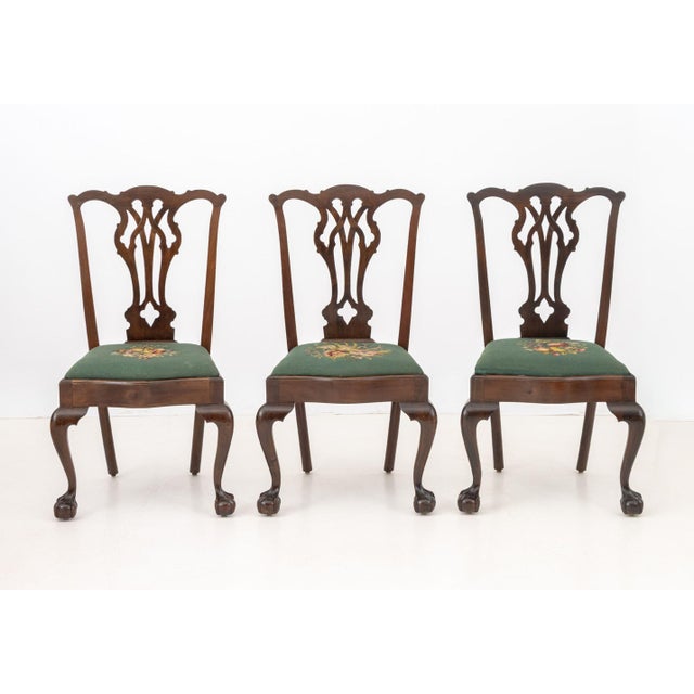 Set of Eight George III Style Mahogany Dining Chairs, two armchairs and six side chairs, each with carved pierced back...