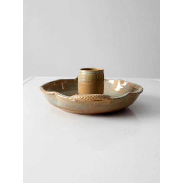 This is a vintage studio pottery chicken roaster pan. Signed by the artist, the handmade ceramic dish features a classic...