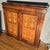 This is a records cabinet (not for vinyl records) made in the style of Louis XV. It has a high level of floral marquetry...