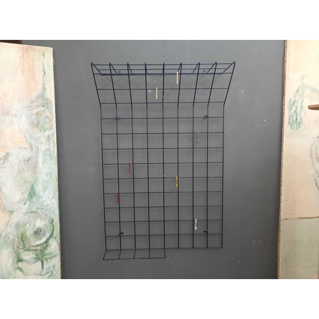 Black wall coat rack by Karl Fichtel. The design comes from the 1950s. Material metal and plastic coated. Good original...