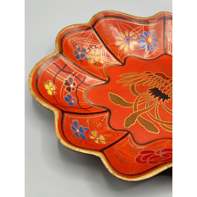 A Japanese lacquer paper mache scalloped oval tray of the Meiji era. It is lovely, hand painted in red and gold with a...
