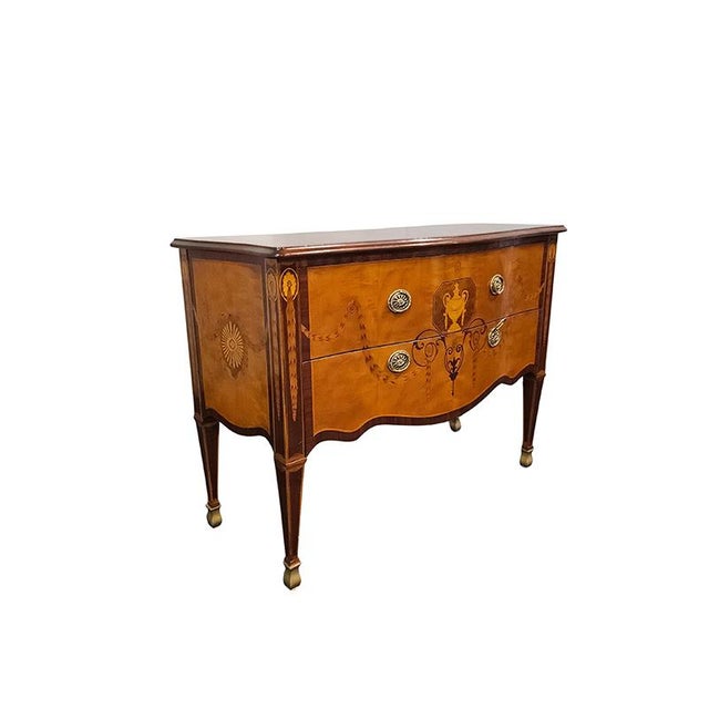 Louis XVI-style walnut burl chest of drawers with two drawers. Enhanced with fine wood inlays. Dimensions (W x D x H): 130...