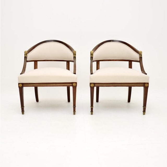 An impressive and beautifully designed pair of antique Swedish neoclassical armchairs. They are in the Neoclassical style,...