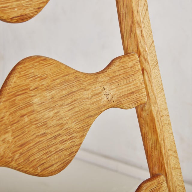 A rare set of 6 Danish Modern ‘Razor Blade’ dining chairs attributed to Henning Kjaernulf for EG Kvalitetsmøbler in the...