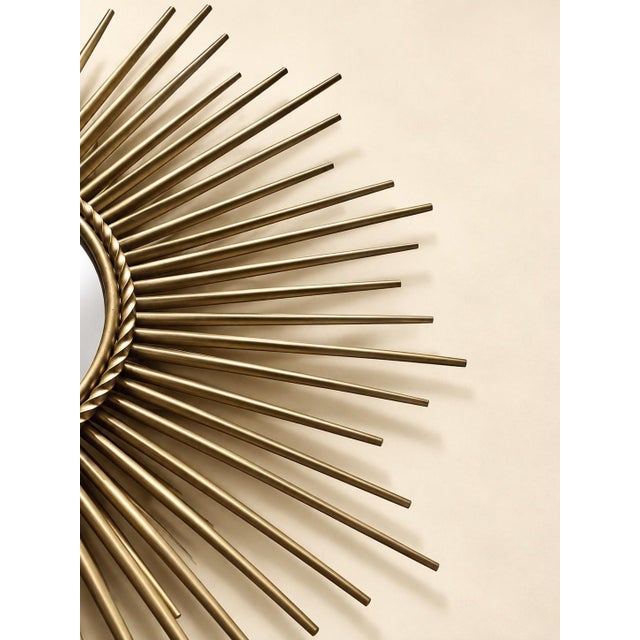Wall-mounted sunburst mirror signed Chaty Vallauris, Provençal manufacturer, Mid-Century Modern period, 1950s-1960s....