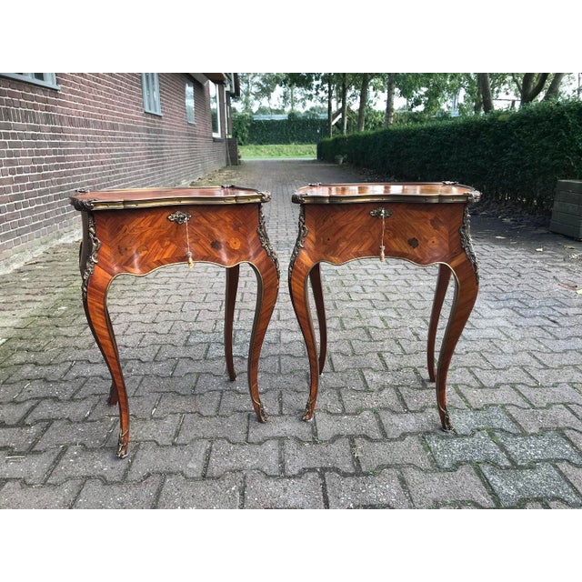 Circa 1850s French Louis XV–Style Marquetry Side Tables – Fruitwood (2 Pieces) Timeless elegance and rare originality...