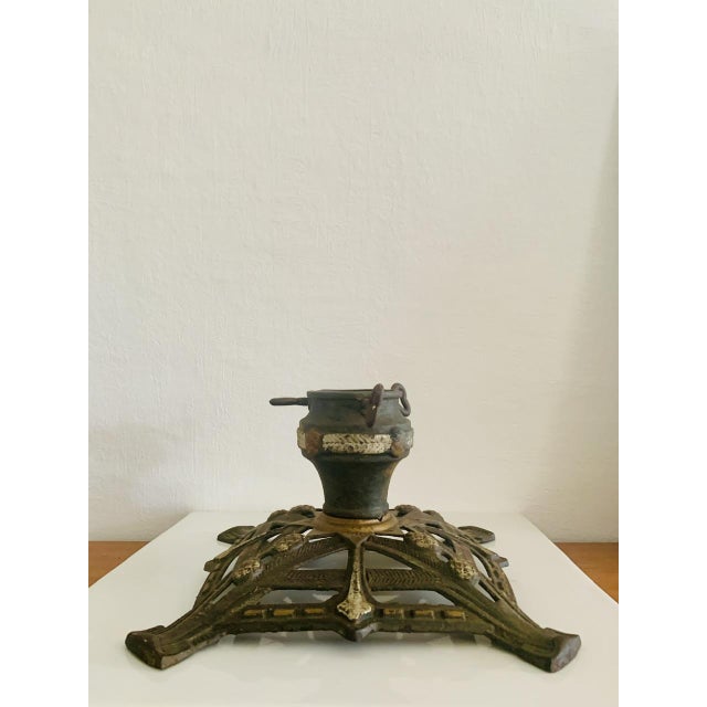 Vintage, art deco, Christmas tree stand made of cast iron, made in Germany, from the early 20th century. This beautiful...