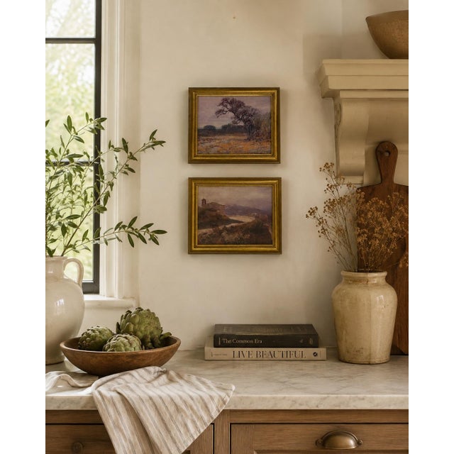 A charming pair of fine art landscape prints presented in coordinating gilt-finish resin/composite frames. Each image has...