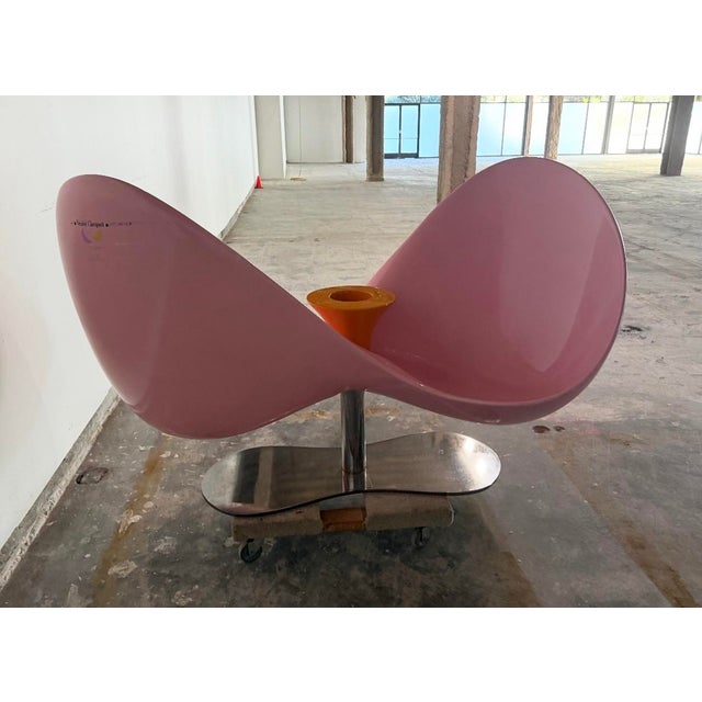 Pink fiberglass loveseat “Tete a Tete” by renowned designer Karim Rashid for Veuve Clicquot’s 250 anniversary. Loveseat is...
