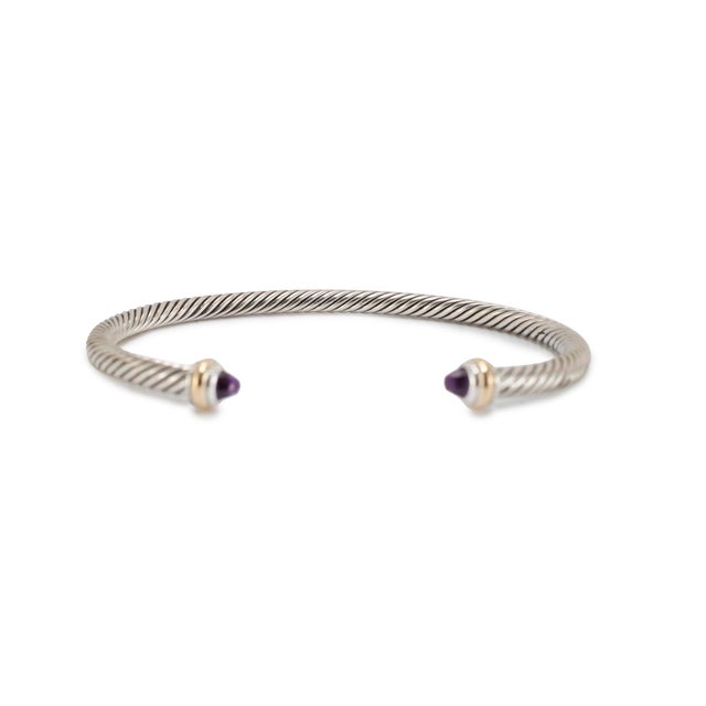 Brand: David Yurman Gender: Unisex Metal Type: Silver & 18K Yellow Gold Length: 7.00 inches Width: 4.00 mm Weight: 17.14...