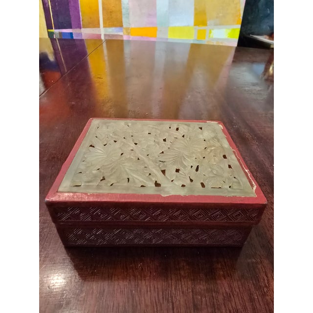 A very fine antique over 100 years old chinese original ( all guaranteed) hand carved reticulated jade and cinnabar box....