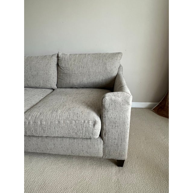 Elevate your space with this Cisco Home Gunner Sofa, a timeless piece that combines eco-conscious craftsmanship,...