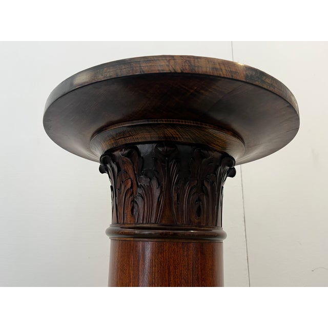 A particularly attractive column for a flowerpot, sculpture, or bust. The column has four flattened legs, a round,...